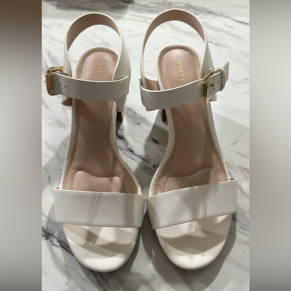 Size 8.5 women’s white with brown faux wooded heel - only worn once